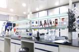 A photograph of a laboratory bench and shelves