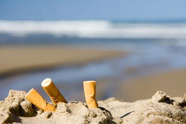 Cigarette butts on marine lifeiStock10011017