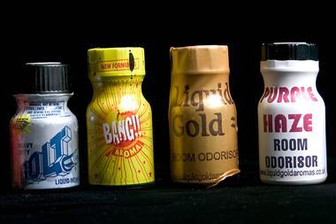A photo of four small poppers bottles. Their colourful plastic wrappers advertise them as room odourisers or aroma with brand names such as Liquid Gold, Bolt and Purple Haze